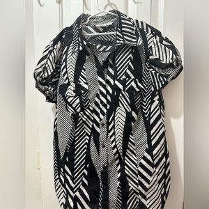 Gently used Cato black and white button down blouse size large.